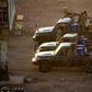 Members of Sudan's intelligence services shoot bullets in the air at the headquarters of the Directorate of General Intelligence Service in the Riyadh district of the capital Khartoum