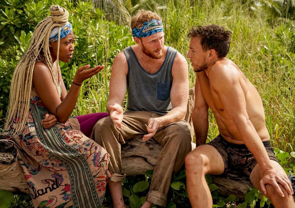Lauren, Tommy, and Dean talk during an episode of Island of the Idols.