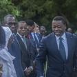 Togolese President Faure Gnassingbe (C) looks set to win another term this year
