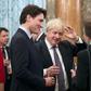 Britain's Princess Anne talks to Britain's Prime Minister Boris Johnson, Canada's Prime Minister Justin Trudeau and other NATO leaders at Buckingham Palace