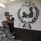 Israeli Ethiopian Jewish hairdresser Baruch works at his barbershop in the southern Israeli city of Ashkelon. Israel's 140,000-strong Ethiopian-Israeli community could  prove pivotal in the Jewish state's tight March 2 election.