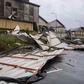 Gusts from the storm reached 120 kilometres an hour in Saint-Etienne, near Lyon, causing a roof to be ripped from a building