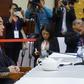 Chinese Foreign Minister Wang Yi (L) says his country's efforts to control the coronavirus outbreak are working