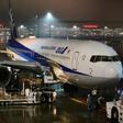 The plane being sent to Wuhan to evacuate Japanese nationals from the virus epicentre readies for departure from Tokyo's Haneda International Airport