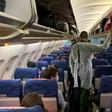 French citizens board an evacuation plane in Wuhan on Thursday night