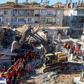 Nearly 4,000 rescue workers combed through debris in freezing temperatures, helped by mechanical diggers, in vain hopes of finding anyone alive
