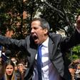 Venezuelan opposition leader and self-proclaimed acting president Juan Guaido shouts on his way to the National Assembly, in Caracas, on January 7, 2020, where he claimed the speaker's chair