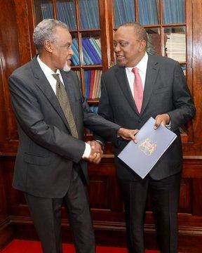 President Uhuru Kenyatta receiving BBI report from Senator Yusuf Haji
