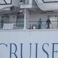 Passengers have been allowed to walk on the deck of the virus-hit Diamond Princess if they wear face masks