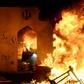 Iraqi forces are cracking down on anti-government protesters after demonstrators torched the Iranian consulate in the holy city of Najaf