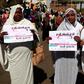 Members of Khartoum's Teachers' Association in front of a court during the trial of intelligence agents who tortured and killed a fellow teacher