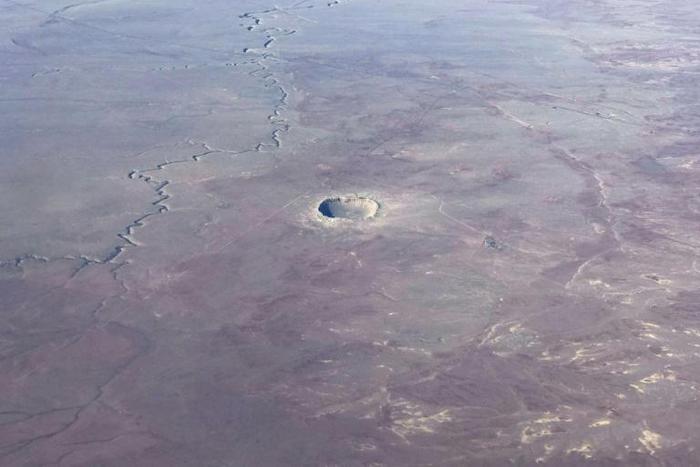 Meteor craters, such as this one in Arizona are difficult to age precisely because he sites tend to be poorly preserved because erosion and tectonic events such as earthquakes erase the geologic past