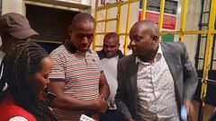 Moses Kuria shortly after being released from police custody