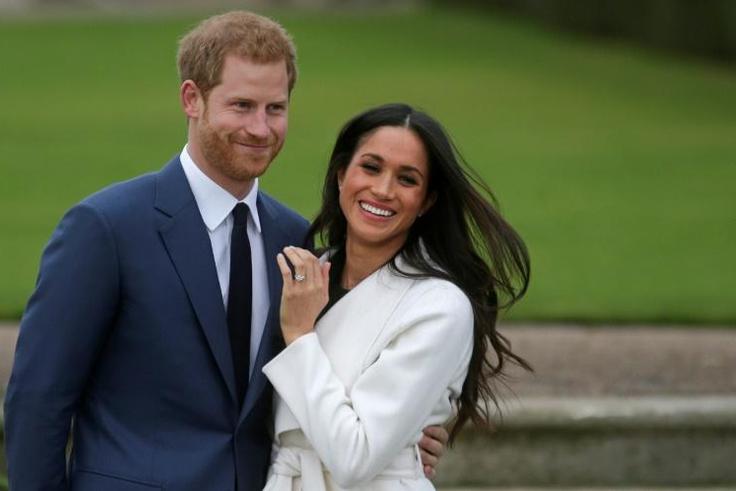 Canadian Prime Minister Justin Trudeau said there are 'discussions going on' as to whether his country will cover security costs for Prince Harry and his wife Meghan Markle (pictured November 2017) as they split their time between Canada and Britain