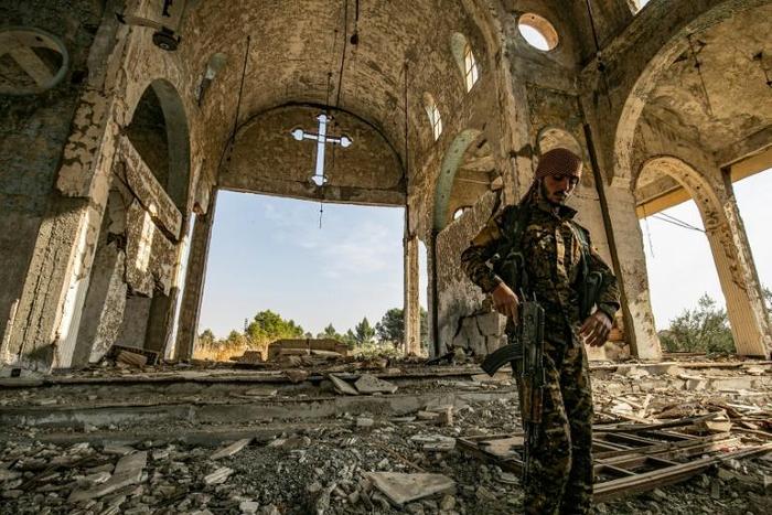 Members of the small Assyrian militia the "Khabur Guards" have taken up the defence of Assyrian towns in the face of a possible Turkish advance