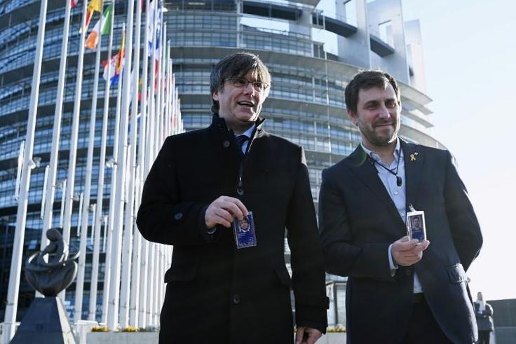 Former Catalan regional president Carles Puigdemont (L) and his former health minister Toni Comin (R) took up their seats in the European Parliament after a European Court of Justice ruling