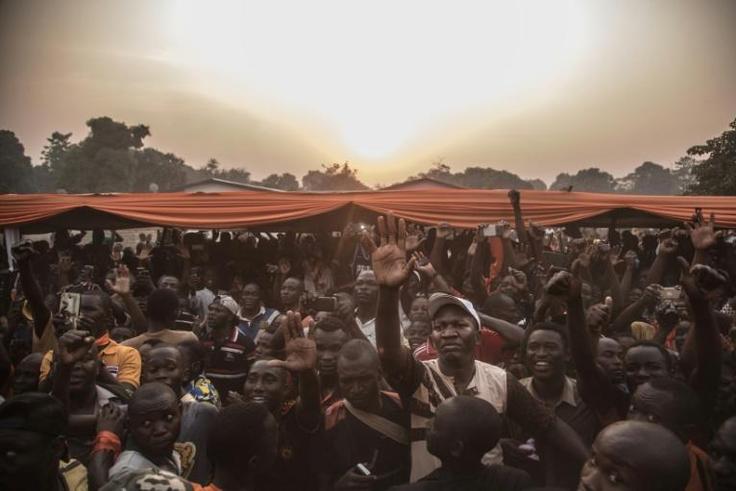 People cheer the return of Francois Bozize to the Boeing district of Bangui