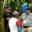 Grab taken from Panamanian channel TVN Noticias showing Panamanian police and employees of the Public Ministry near the site where a mass grave was found with seven bodies at the indigenous region of Ngabe Bugle, in Bocas del Toro province, Panama, on ...
