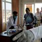 Passengers from an international flight being screened at Juba International Airport in South Sudan
