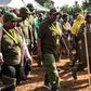 Ugandan President Yoweri Museveni and veterans and Members of Parliament, march through the jungle as he retraces the route which his guerrilla forces took 35 years ago