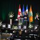 Mourners speak on stage during a memorial service for the victims of Ukrainian Airlines flight PS752 crash in Iran