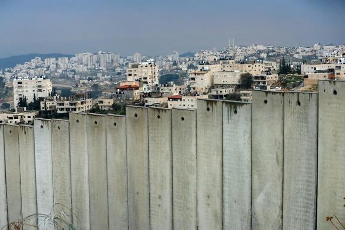 The occupied West Bank village of al-Eizariya lies behind Israel's controversial separation barrier on the outskirts of East Jerusalem