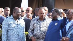 File image of President Uhuru Kenyatta (center), African Union Envoy Raila Odinga and Muhoroni MP Onyango Koyoo