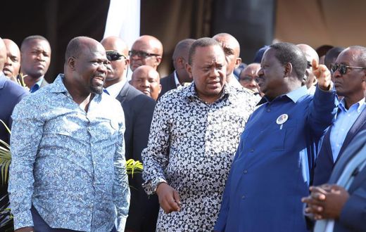 File image of President Uhuru Kenyatta (center), African Union Envoy Raila Odinga and Muhoroni MP Onyango Koyoo