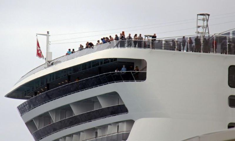 Passengers remain onboard the MSC Meraviglia cruise ship in Cozumel, Mexico, awaiting a decision on whether they can disembark