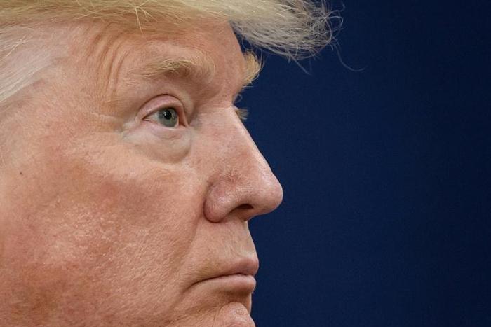 US President Donald Trump dismissed the impeachment and global warming threats alike