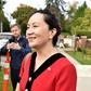 Huawei Chief Financial Officer, Meng Wanzhou, stops to talk to media while leaving her Vancouver home to appear in British Columbia Supreme Court, in Vancouver, on October 1, 2019