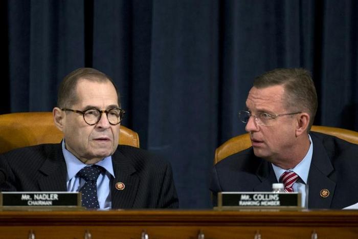 House Judiciary Committee Chairman Jerry Nadler (L) and Doug Collins, the senior Republican on the committee, in a hearing on the articles of impeachment against President Donald Trump