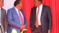 File image of President Uhuru Kenyatta and Ferdinand Waititu at a past event