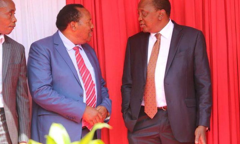 File image of President Uhuru Kenyatta and Ferdinand Waititu at a past event