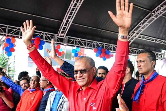 Navin Ramgoolam (C)
is one of the rivals running against the prime minister