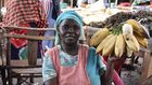 Jennifer Nagut from Maero village in Uganda displays the bananas at her stall in Busia, Kenya. She is among several Ugandan women who cross the border every day to sell nutritious foodstuffs to Kenya | Photo by Faith Matete