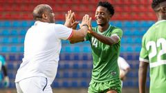 Harambee Stars player Mansur Suleiman with Coach Benni McCarthy