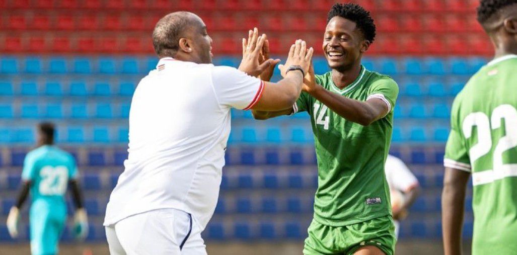 Harambee Stars player Mansur Suleiman with Coach Benni McCarthy