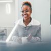 A woman in an office kitchen