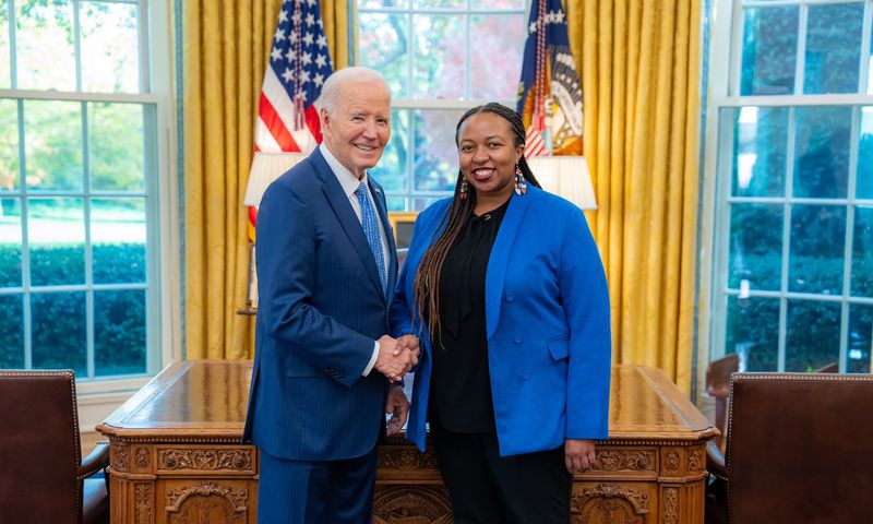 Kenyan-Born photographer Polly Irungu with U.S President Joe Biden