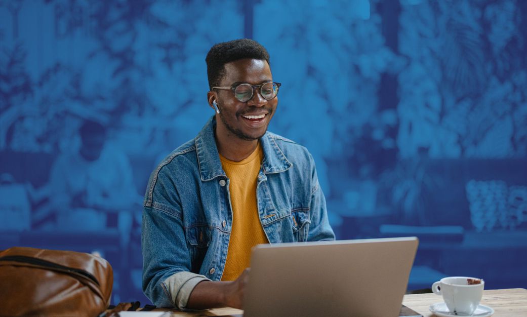 A man working on their laptop