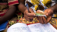 A woman counting money