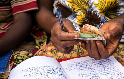 A woman counting money
