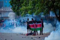 Young protesters standing in solidarity with their fallen comrade on June 25, 2024, in Nairobi.