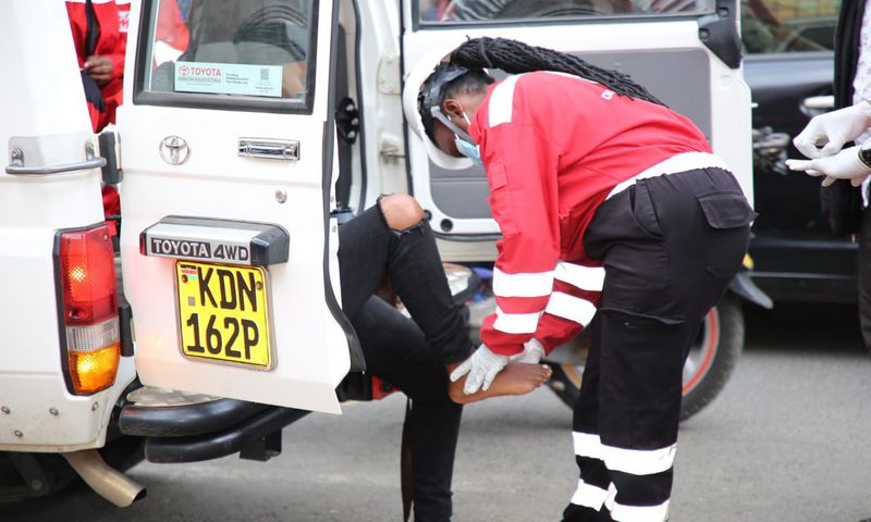 A Red Cross  Kenya Volunteer treating an injured person during recent demonstrations on June 17 2025