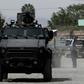 Police patrol after nine people were killed in the La Huertas neighborhood of Tlaquepaque, Mexico