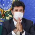 Health Minister Luiz Henrique Mandettat takes President Jair Bolsonaro's snubs in his stride