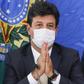 Health Minister Luiz Henrique Mandettat takes President Jair Bolsonaro's snubs in his stride