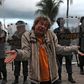 Protestors against Brazilian President Jair Bolsonaro and the way he has dealt with the coronavirus pandemic gathered at Copacabana beach in Rio de Janeiro