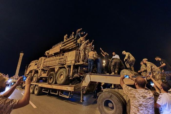 Forces loyal to Libya's UN-recognised Government of National Accord (GNA) parade a Russian-made Pantsir air defence system in Tripoli on May 20 -- seized during one of the recent military successes against Khalifa Haftar's troops